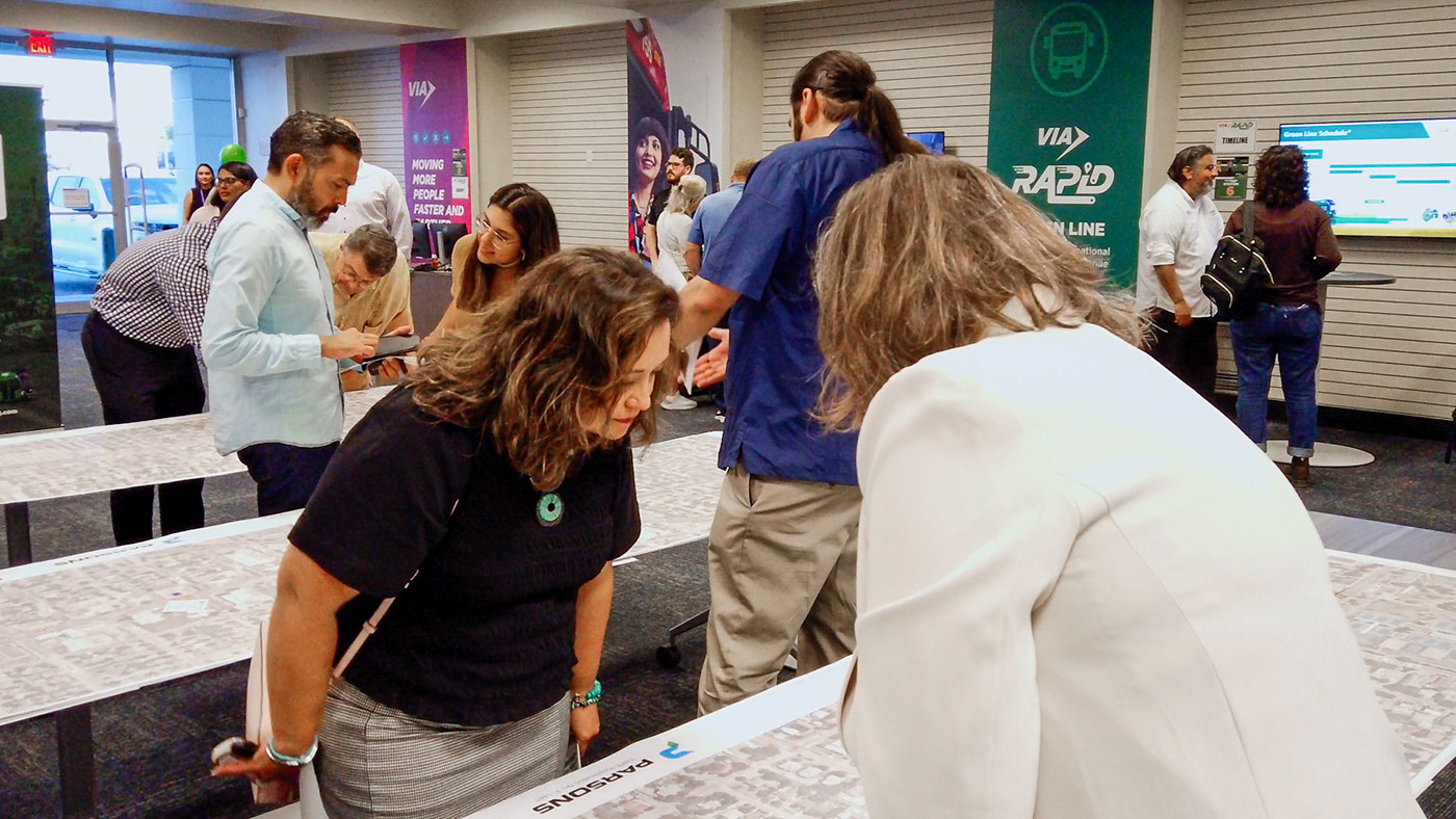 Photo of community members visiting the VIA Rapid project office